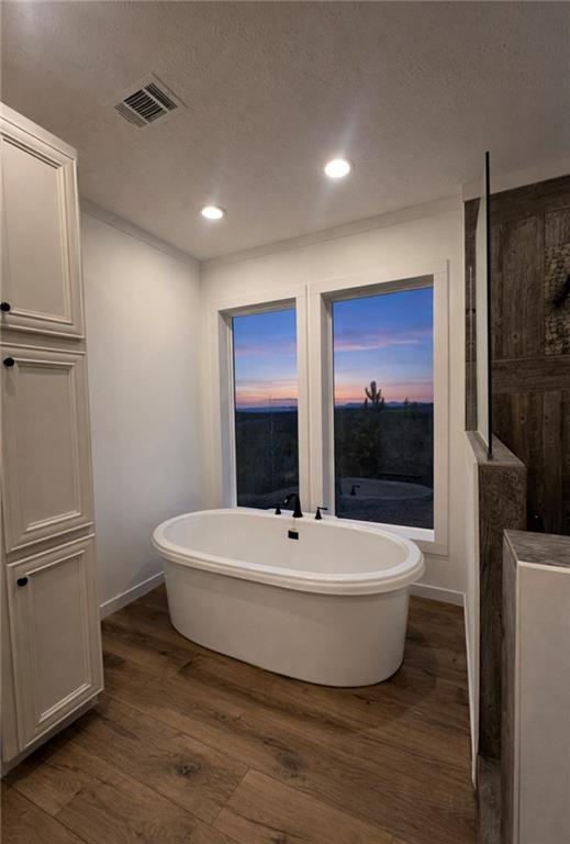 1590 Buttermilk Road Southwest Cave Spring, GA 30124 - Photo 32 of 43 a bathroom with a white tub shower and vanity