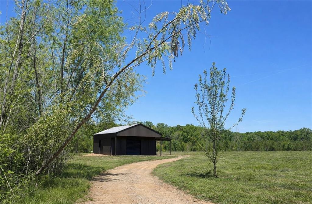 1590 Buttermilk Road Southwest Cave Spring, GA 30124 - Photo 4 of 43 a view of a house with a yard