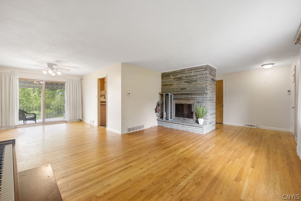 4156 Griffin Road Onondaga, NY 13215 - Photo 4 of 19 Large living area with woodburning fireplace