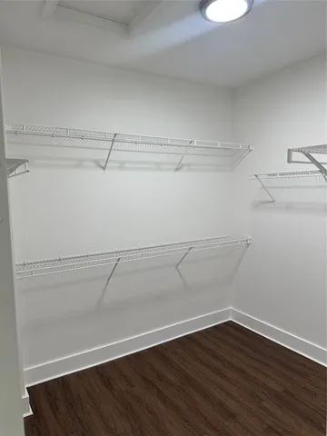 a view of a room with racks on the wall