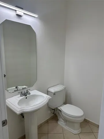 a bathroom with a sink and a toilet