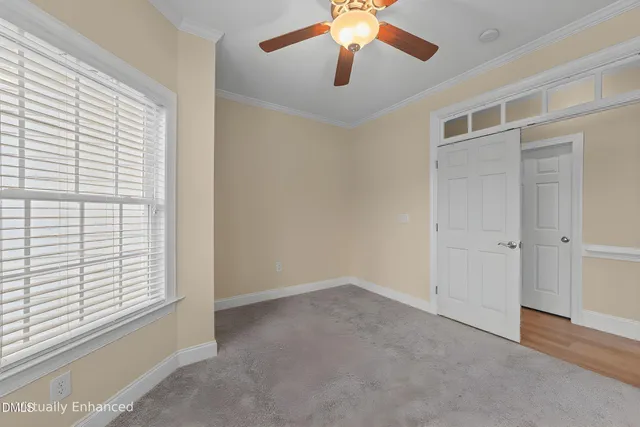 a living room with furniture fireplace and a flat screen tv