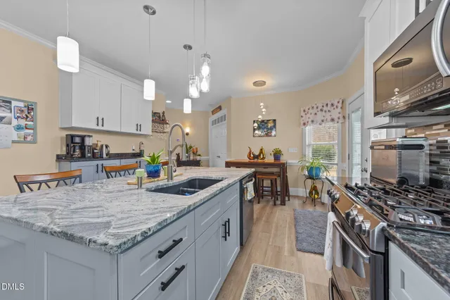a bathroom with a shower and a sink