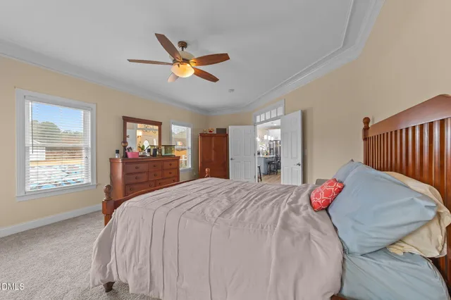 a view of a livingroom with furniture and window