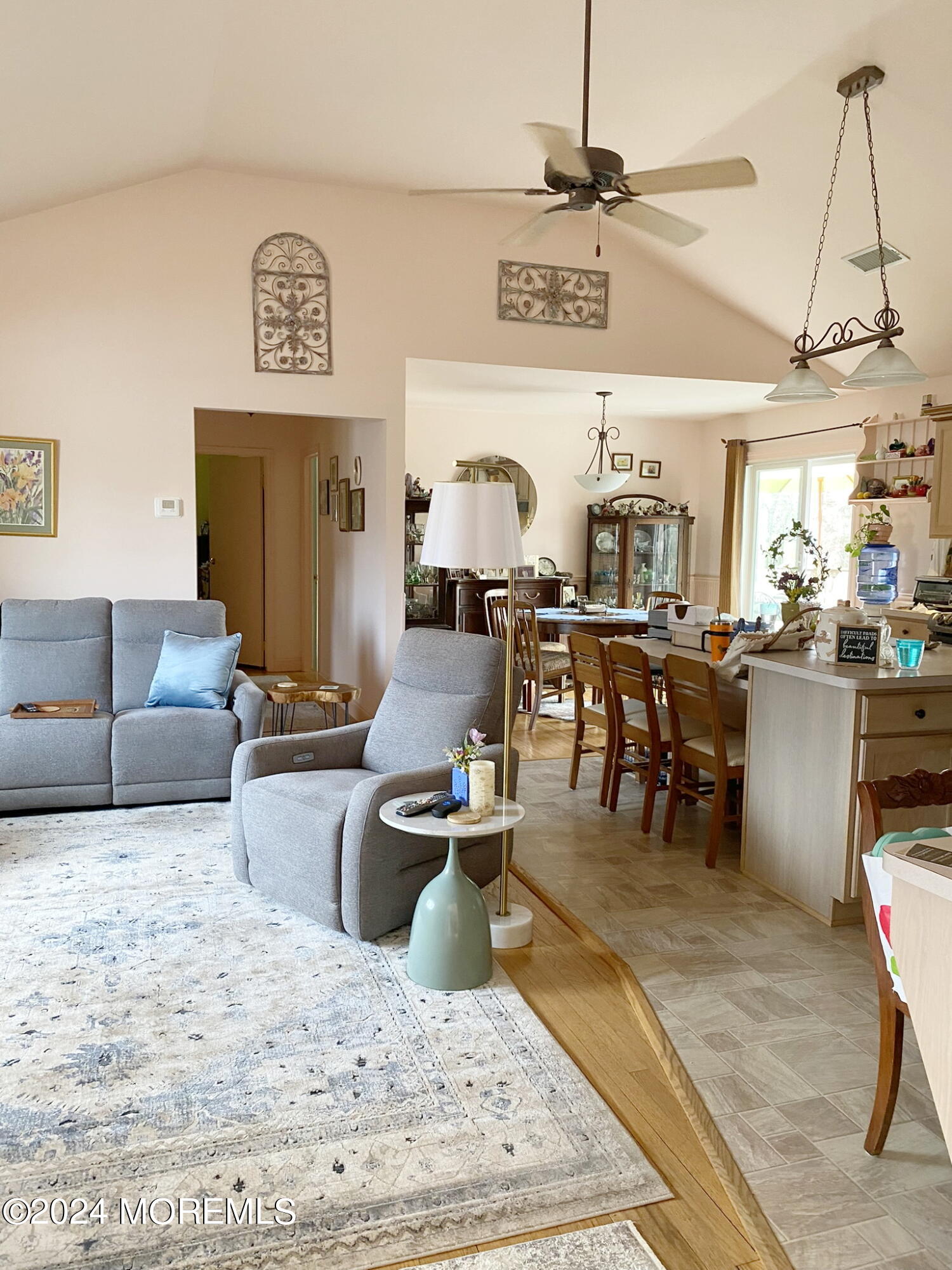 1621 Forge Pond Road Brick, NJ 08724 - Photo 5 of 29 a living room with furniture and a chandelier