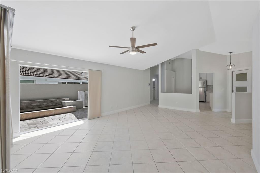 11054 Linnet Lane Naples, FL 34119 - Photo 12 of 50 a view of an empty room with a bathroom