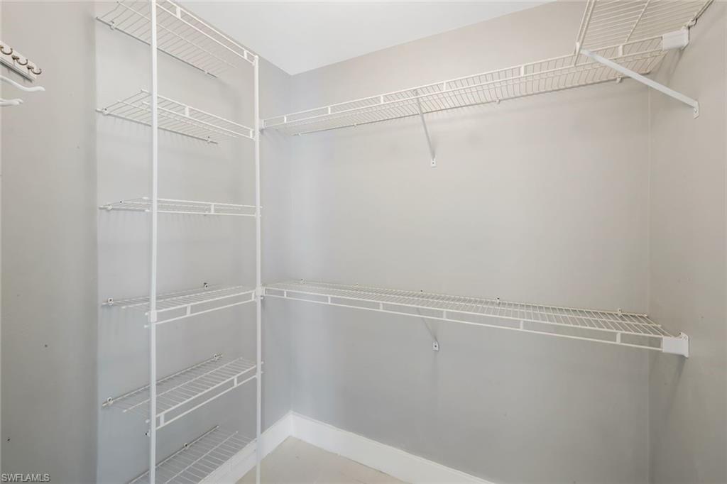 11054 Linnet Lane Naples, FL 34119 - Photo 26 of 50 a view of an empty walk in closet