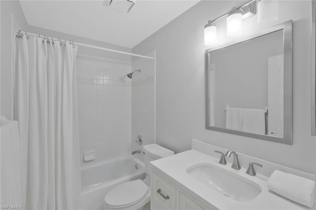 11054 Linnet Lane Naples, FL 34119 - Photo 29 of 50 a bathroom with a sink toilet and shower