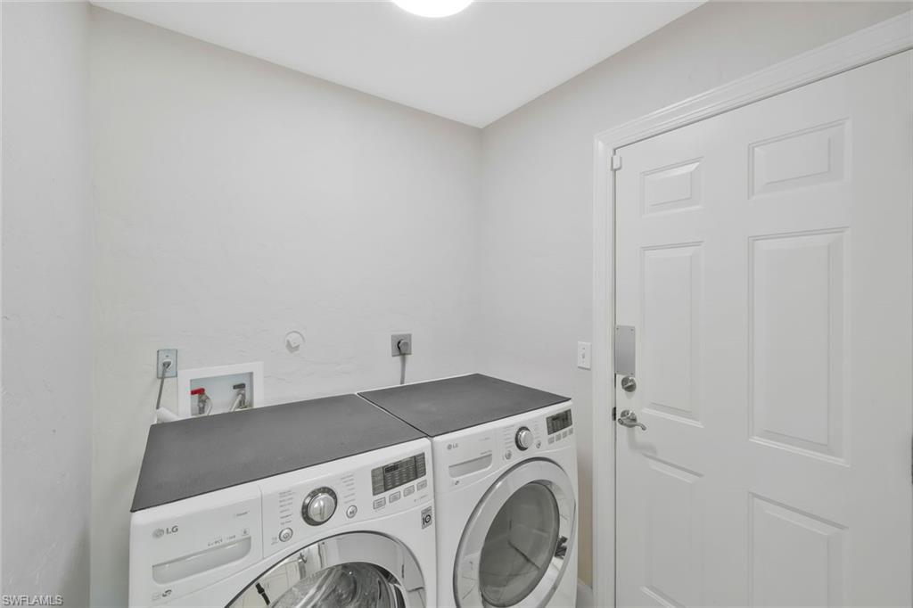 11054 Linnet Lane Naples, FL 34119 - Photo 32 of 50 a utility room with dryer and washer