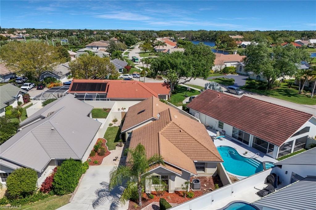 11054 Linnet Lane Naples, FL 34119 - Photo 45 of 50 an aerial view of a house with a yard