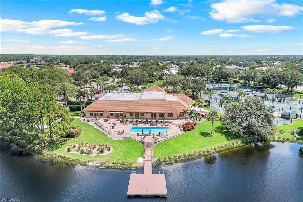 11054 Linnet Lane Naples, FL 34119 - Photo 46 of 50 an aerial view of a house with a garden and lake view
