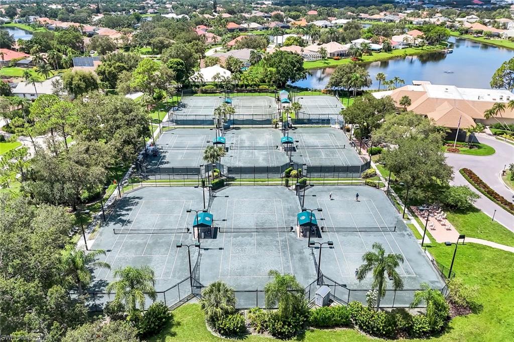 11054 Linnet Lane Naples, FL 34119 - Photo 48 of 50 an aerial view of residential houses with outdoor space