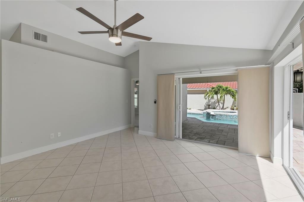 11054 Linnet Lane Naples, FL 34119 - Photo 9 of 50 a view of an empty room and window