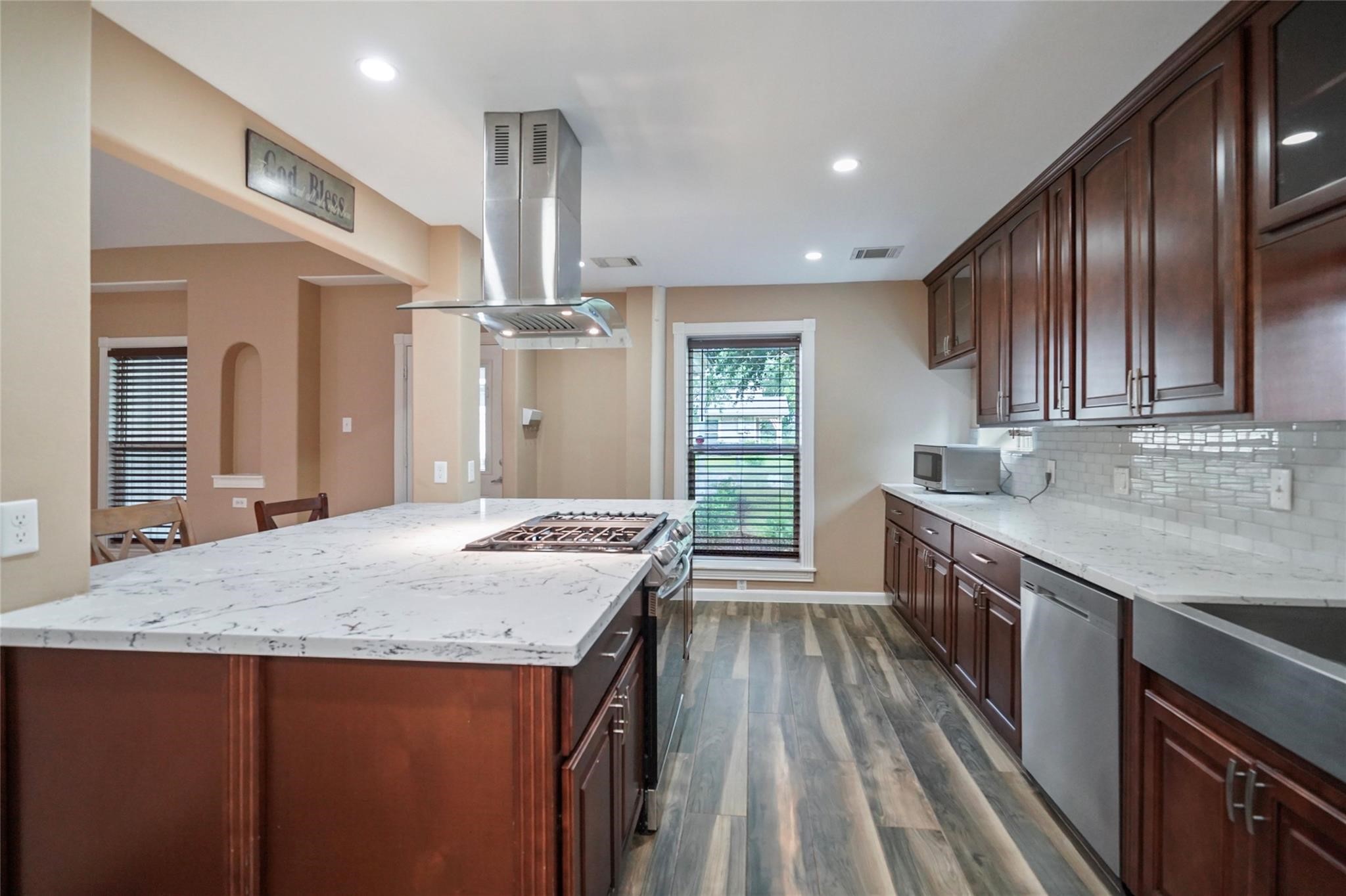 30720 Waller Spring Creek Road Waller, TX 77484 - Photo 8 of 22 Wonderful updated island kitchen with stainless steel appliances.