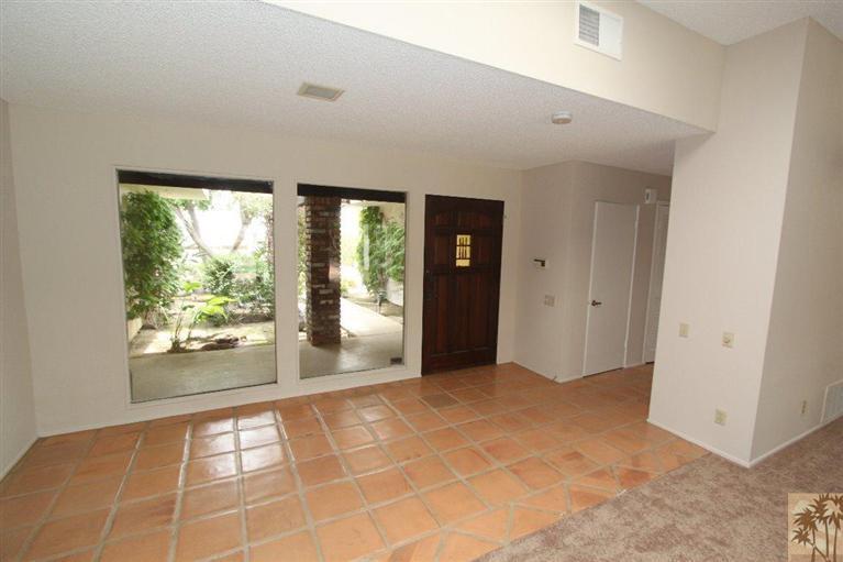 71371 Biskra Road Rancho Mirage, CA 92270 - Photo 14 of 39 a view of hallway with windows
