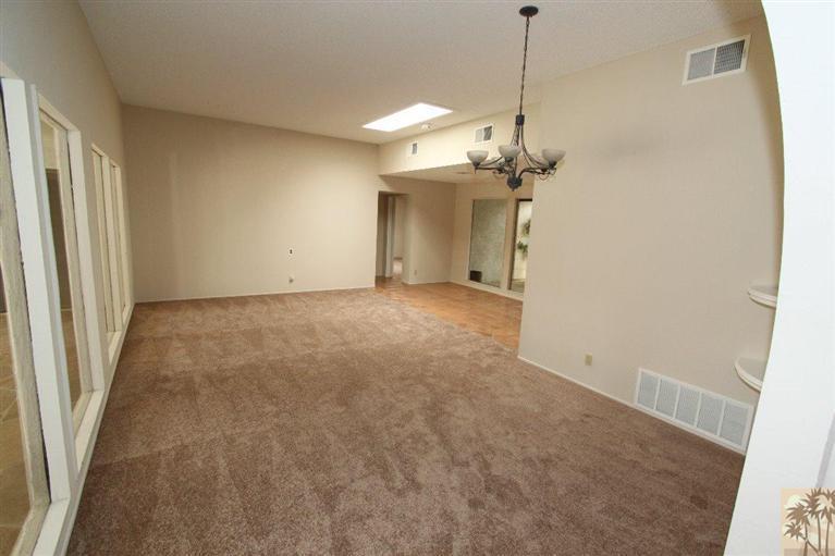 71371 Biskra Road Rancho Mirage, CA 92270 - Photo 18 of 39 a view of a room with a chandelier