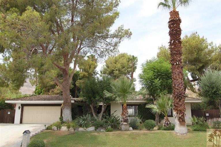 71371 Biskra Road Rancho Mirage, CA 92270 - Photo 7 of 39 a front view of a house with garden