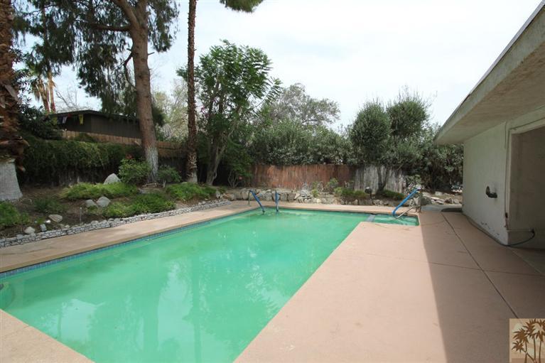 71371 Biskra Road Rancho Mirage, CA 92270 - Photo 9 of 39 a view of swimming pool from a patio