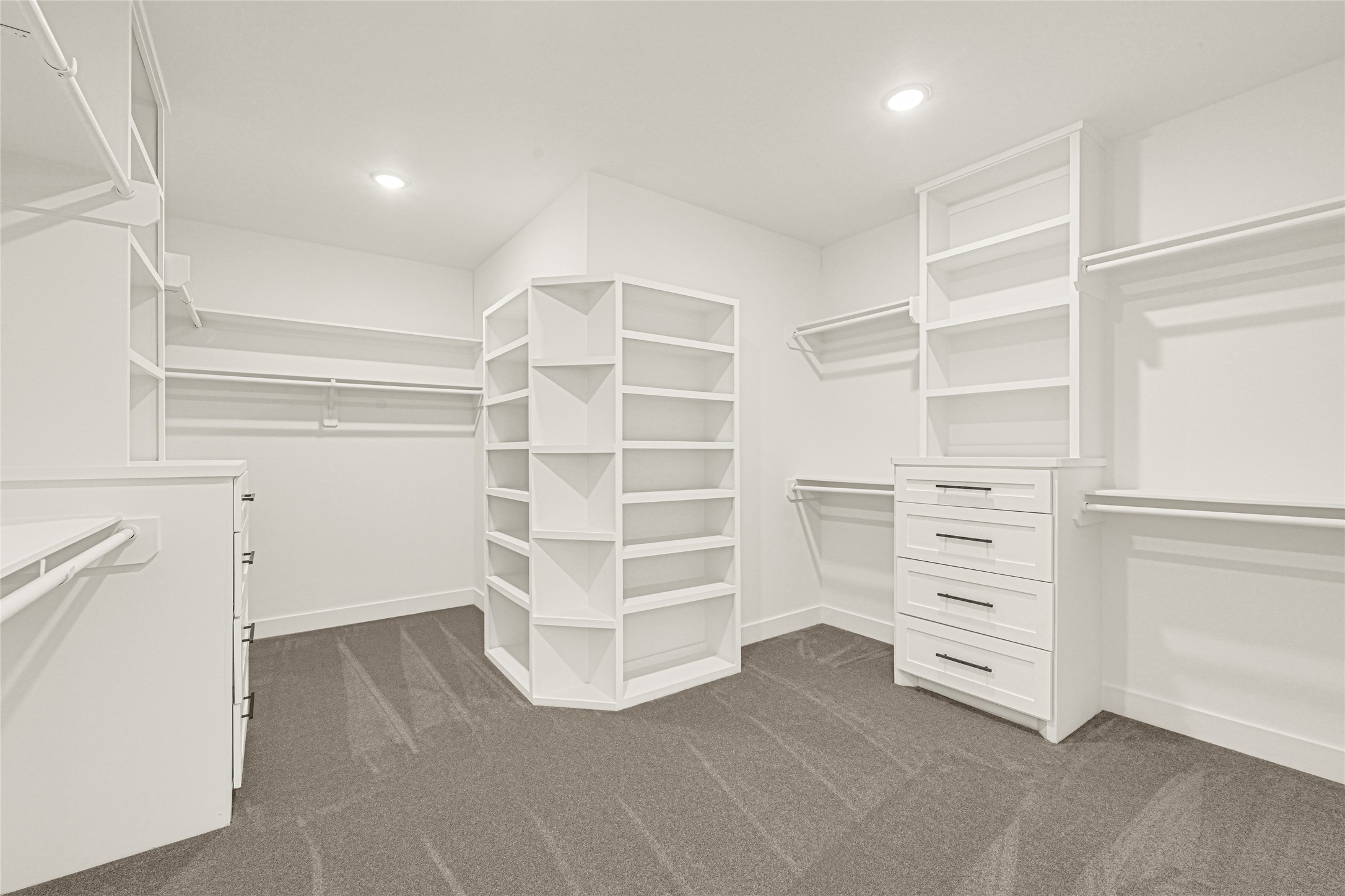 16915 Hamill Drive Rosharon, TX 77583 - Photo 41 of 47 a view of walk in closet with empty racks