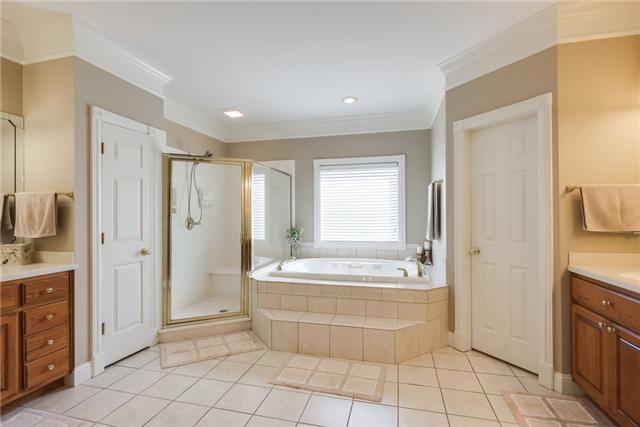 1475 Ridley Drive Franklin, TN 37064 - Photo 13 of 20 Master bath is huge. No elbowing each other while sharing this bath. All baths have tile floors except powder room which is hardwood,