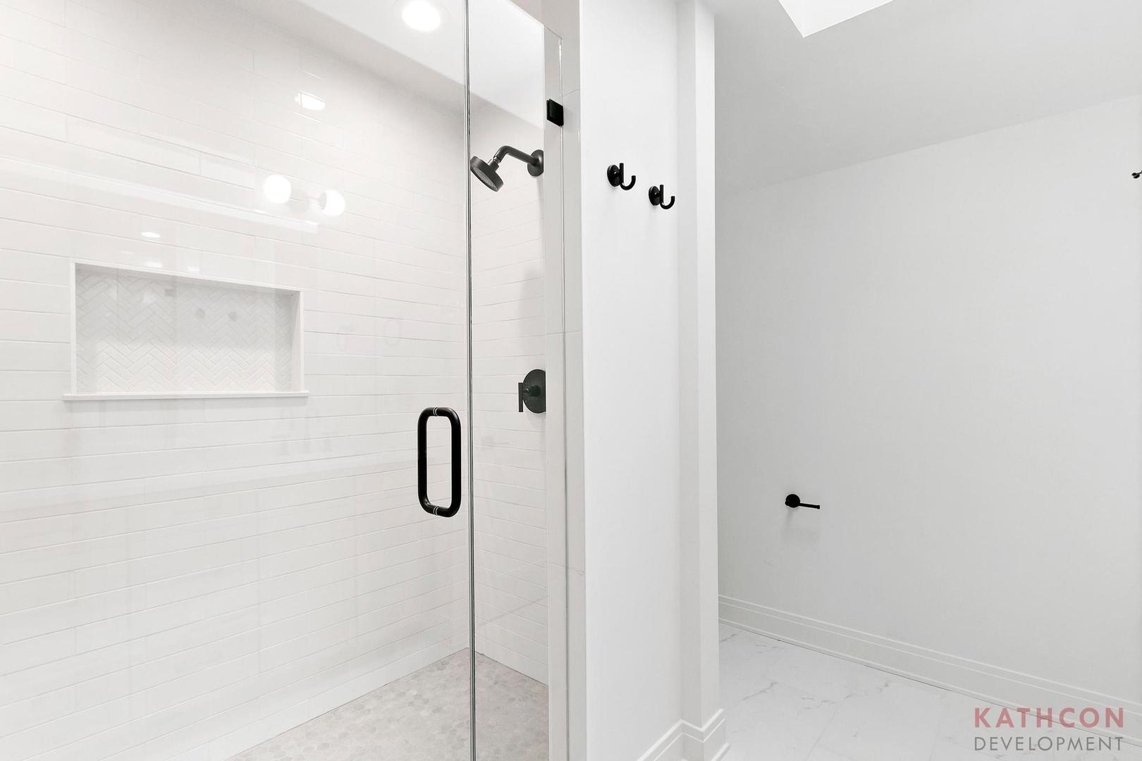 650 Sanders Road Northbrook, IL 60062 - Photo 5 of 24 a bathroom with a shower