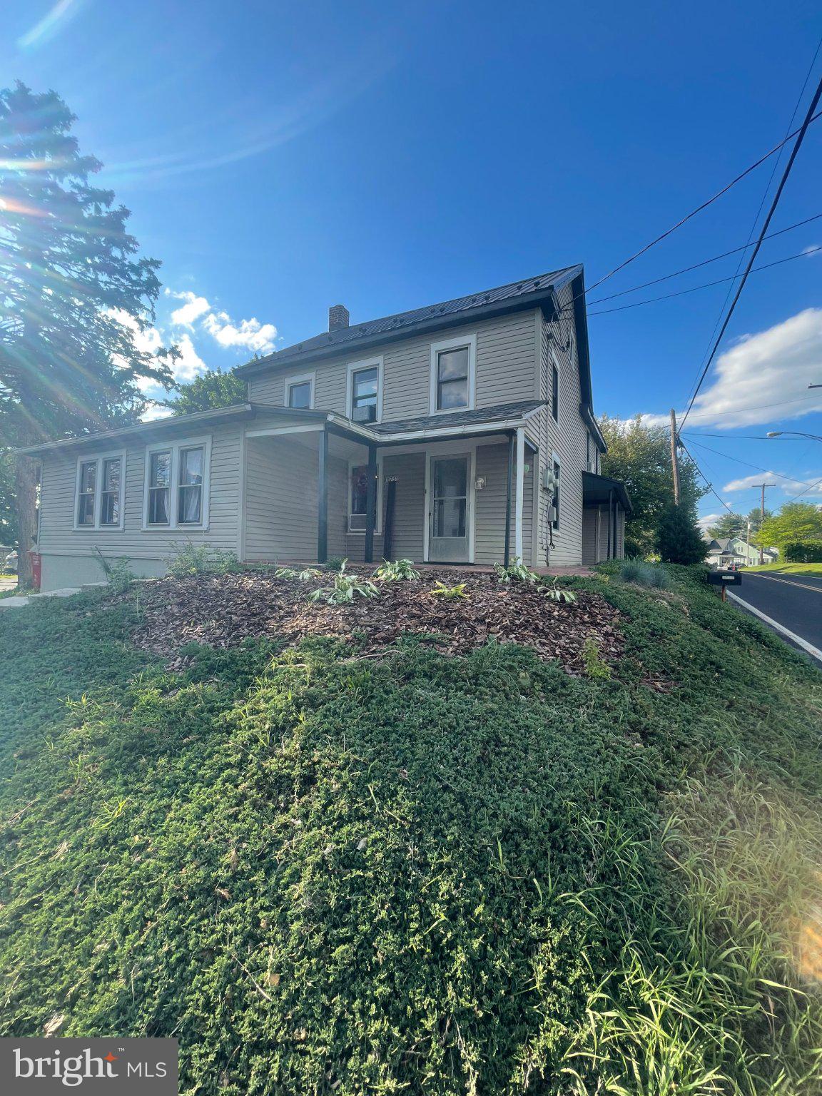 Charming home with inviting curb appeal.
