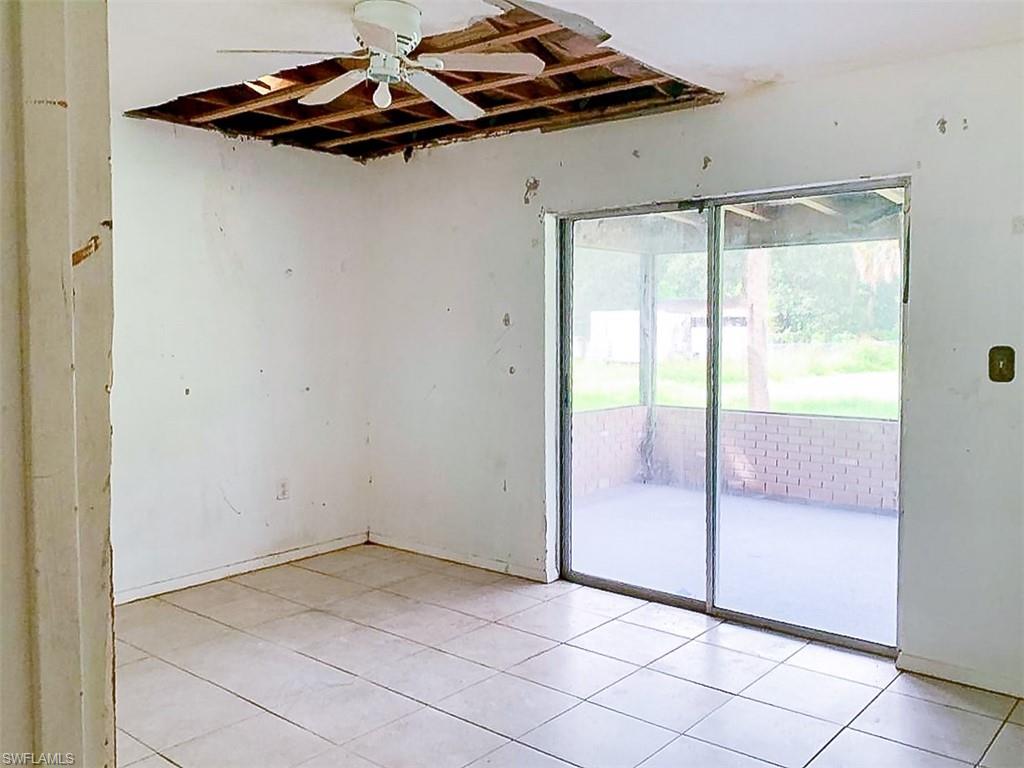 5975 Green Boulevard Naples, FL 34116 - Photo 15 of 20 a view of an empty room