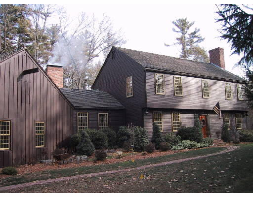 77 Herrick Road Boxford, MA 01921 - Photo 1 of 1 a front view of a house with a yard and potted plants