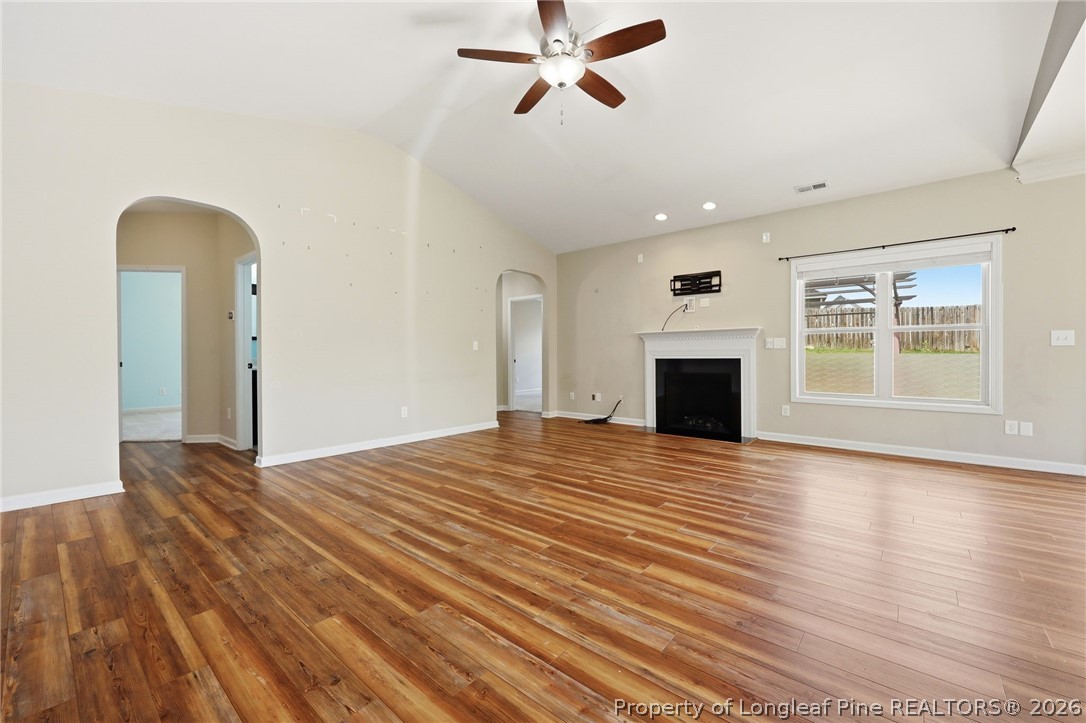 33 Colonist Place Cameron, NC 28326 - Photo 10 of 47 a view of empty room with wooden floor and fan