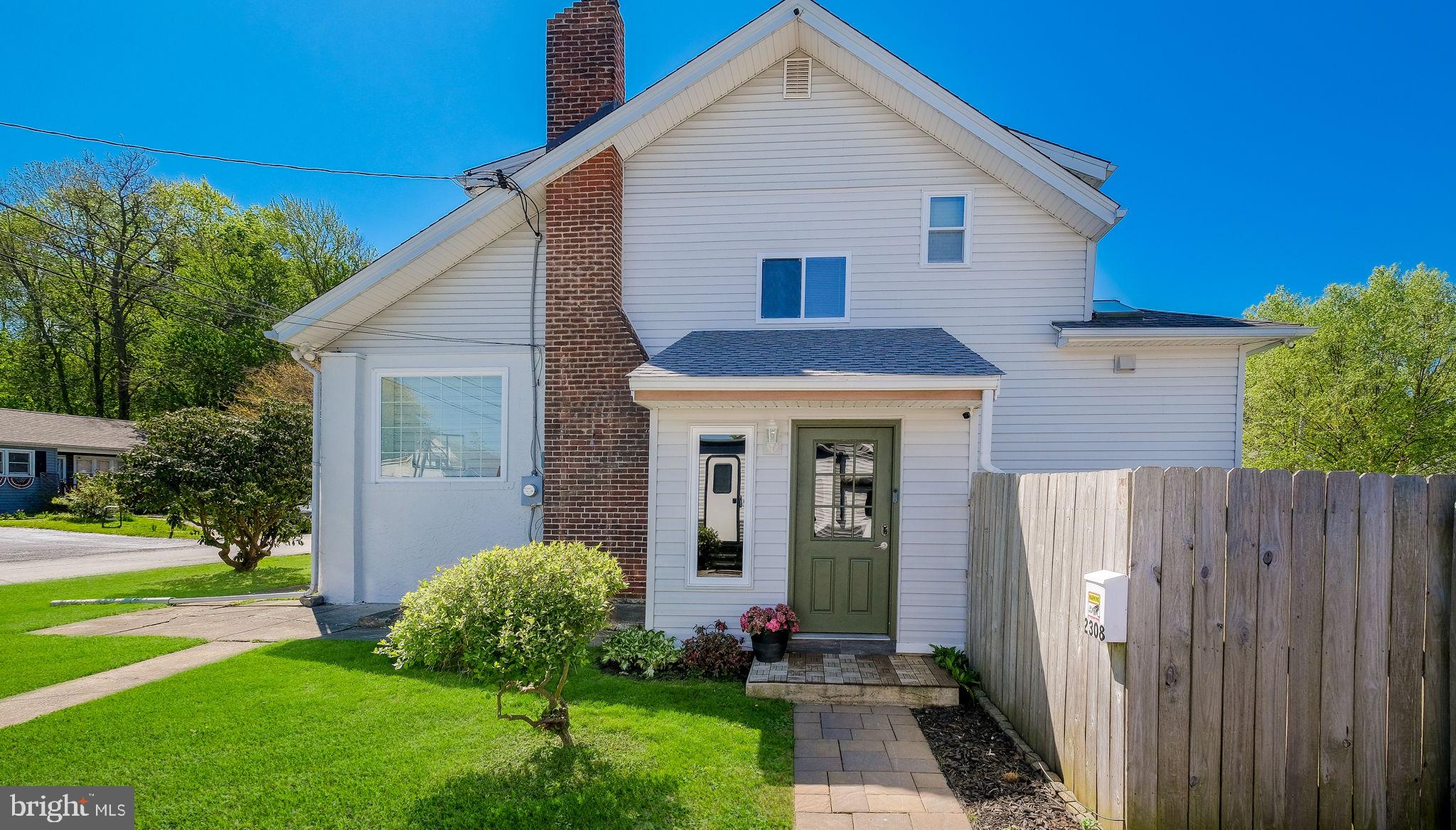 2308 3rd Marcus Hook, PA 19061 - Photo 2 of 37 a front view of a house with garden
