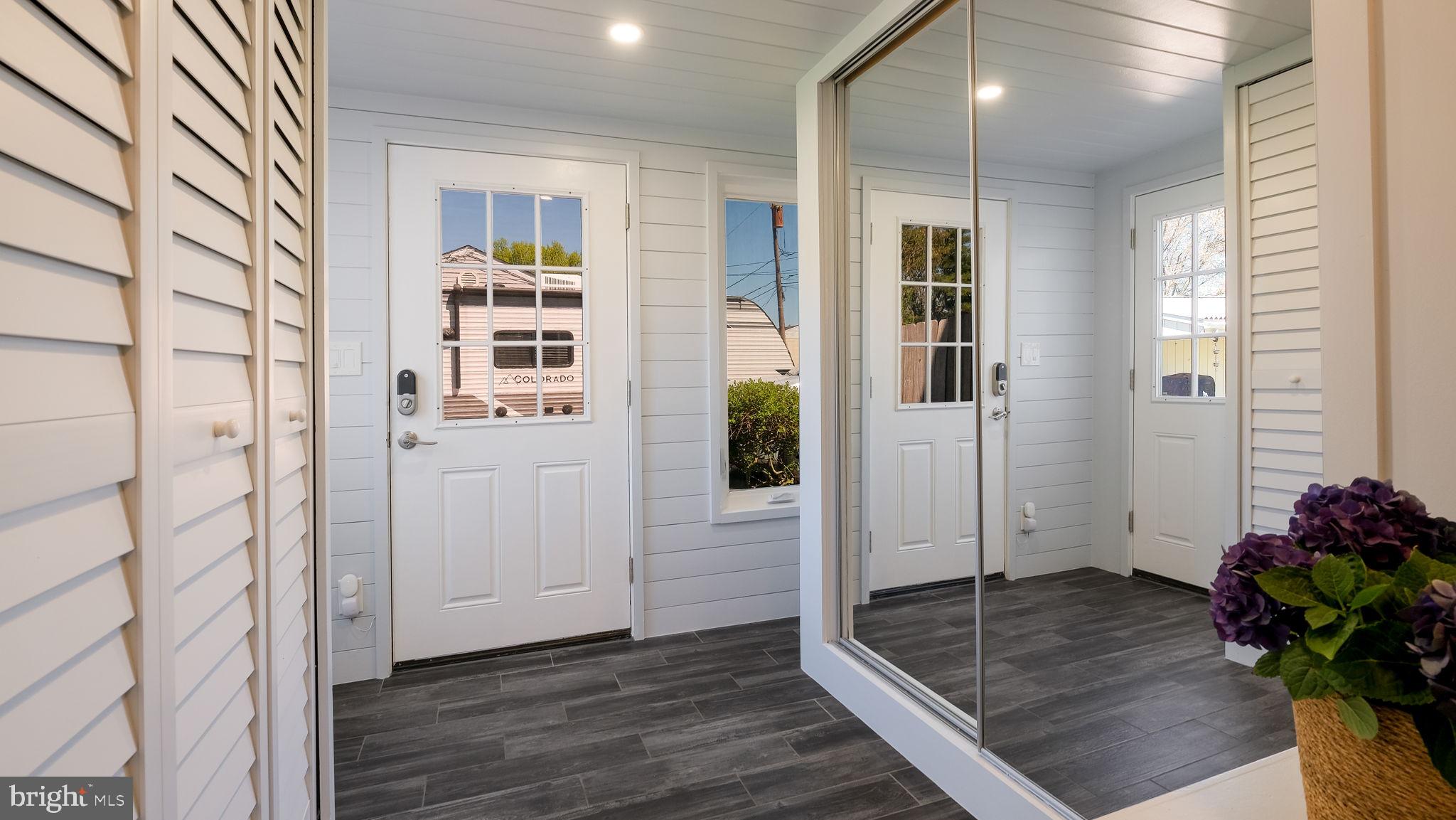 2308 3rd Marcus Hook, PA 19061 - Photo 29 of 37 a view of a hallway with wooden floor and a living room