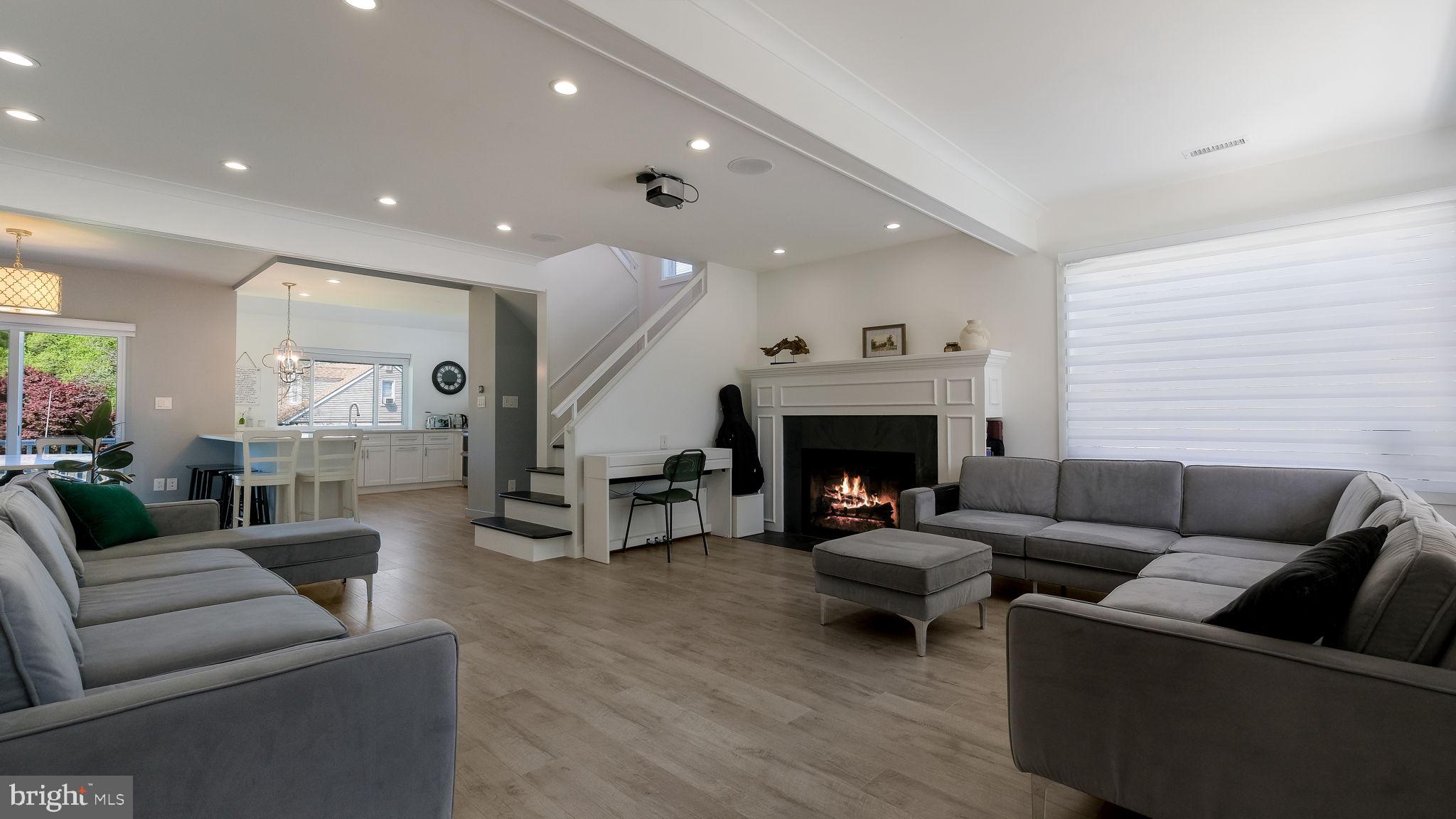 2308 3rd Marcus Hook, PA 19061 - Photo 4 of 37 a living room with furniture and a fireplace