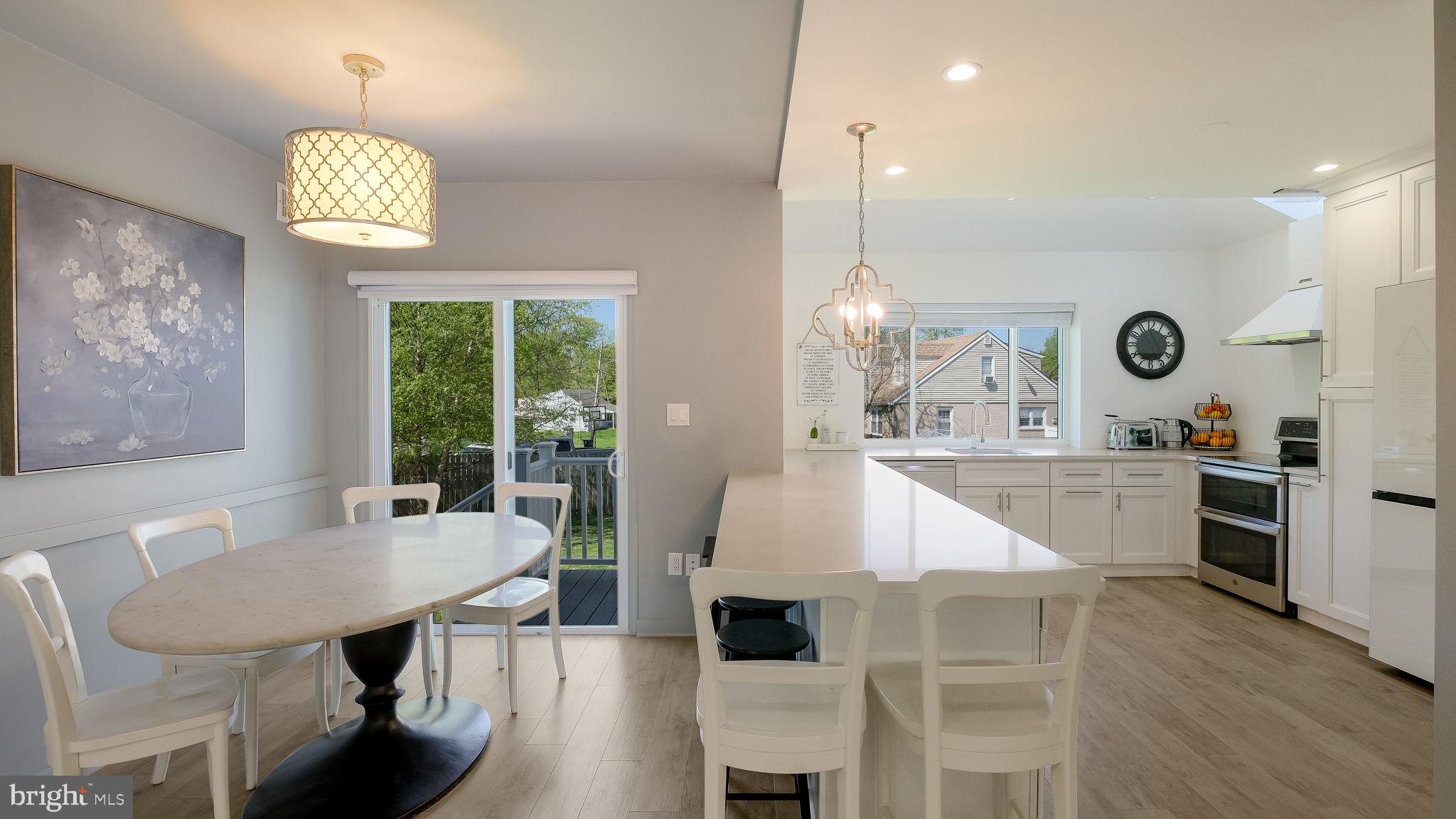 2308 3rd Marcus Hook, PA 19061 - Photo 6 of 37 a living room with granite countertop furniture a window and kitchen view