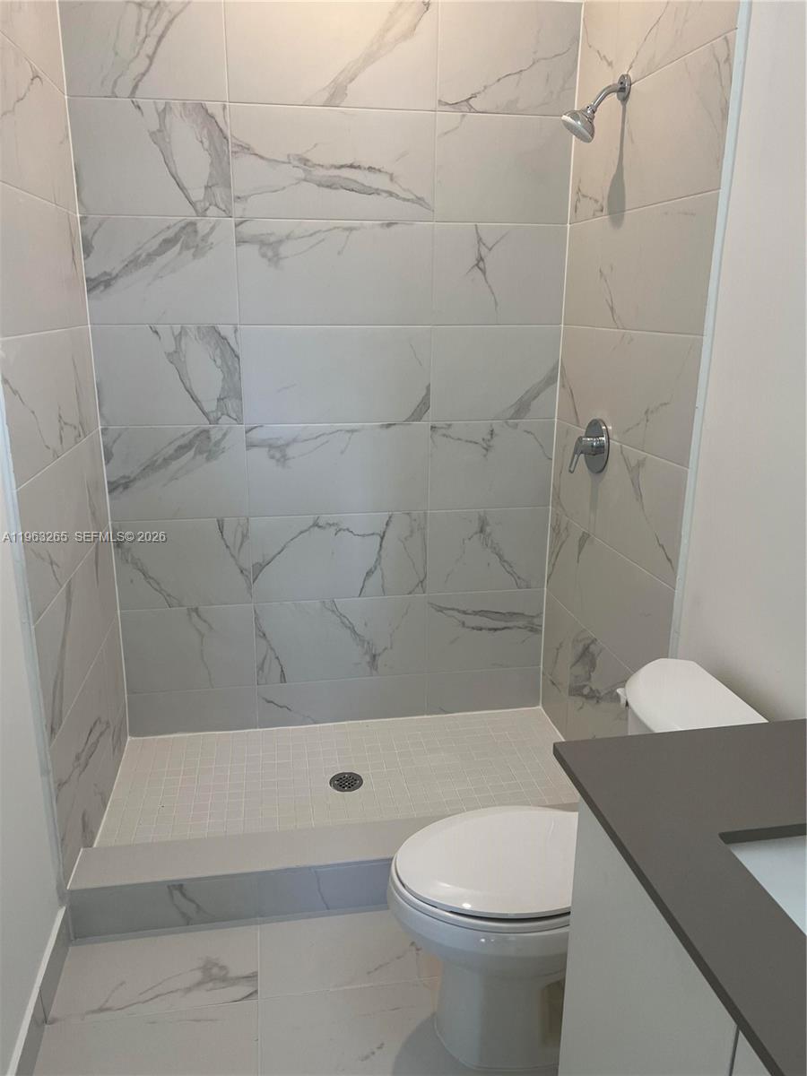 34531 Southwest 191st Avenue Homestead, FL 33030 - Photo 11 of 20 a bathroom with a toilet and a shower