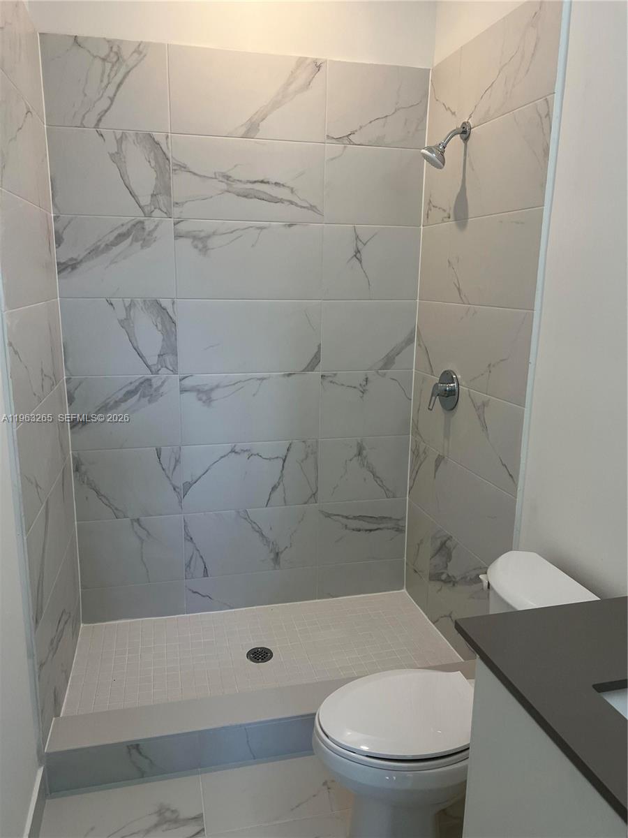 34531 Southwest 191st Avenue Homestead, FL 33030 - Photo 12 of 20 a bathroom with a toilet and a shower