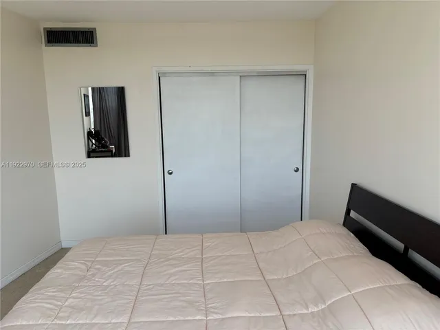 a room that has a bed in it