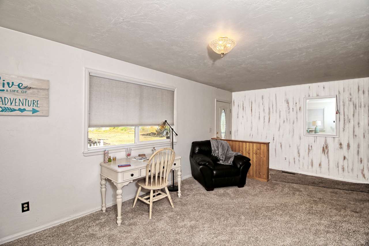 1066-19 19 1/2 Road Fruita, CO 81521 - Photo 4 of 42 a view of a livingroom with furniture and a window