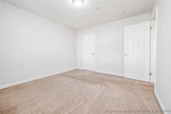 an empty room with an entryway