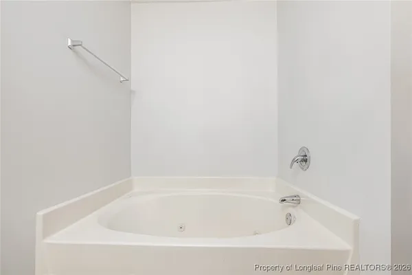 a bathroom with bathtub