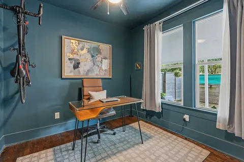 a living room with furniture and a window