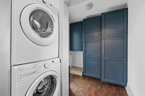 a view of livingroom with washer and dryer