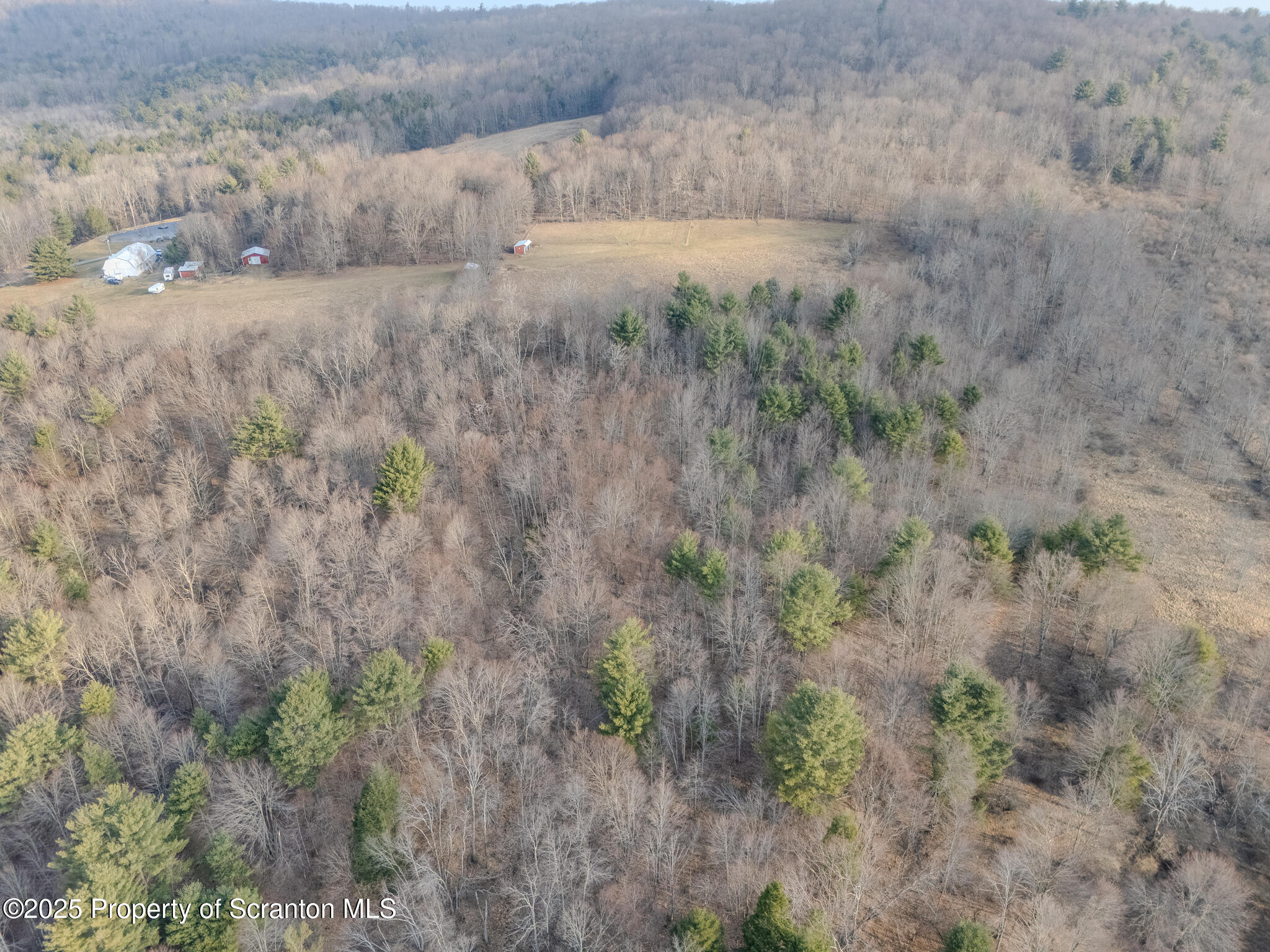 238 Blake Road Friendsville, PA 18818 - Photo 14 of 22 a view of a dry field