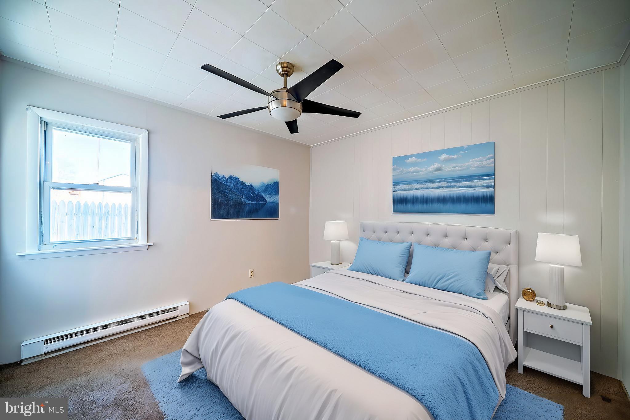 321 Wynnewood Road Ewing, NJ 08628 - Photo 21 of 31 a bedroom with a large bed and a ceiling fan