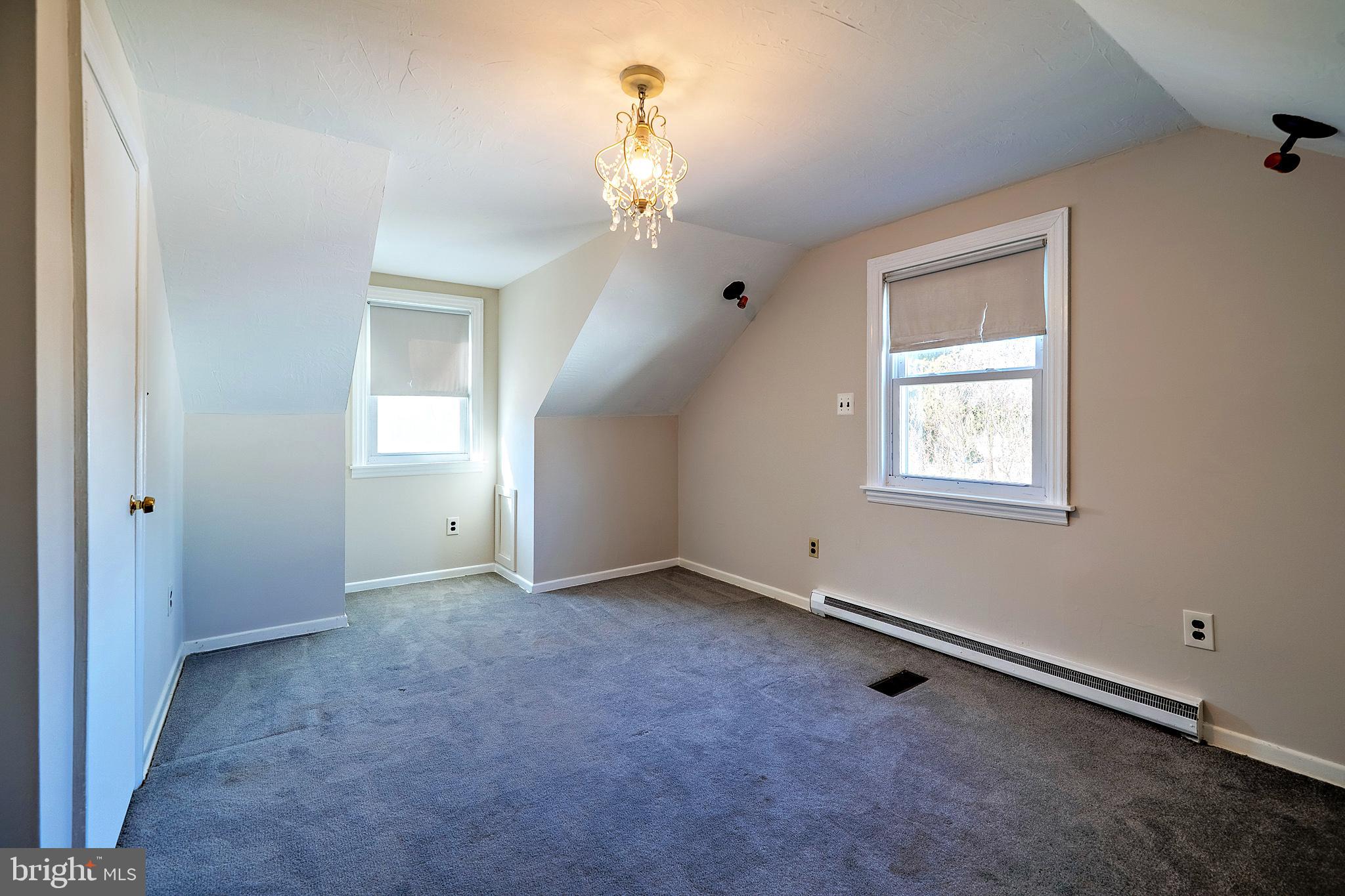 321 Wynnewood Road Ewing, NJ 08628 - Photo 25 of 31 an empty room with windows