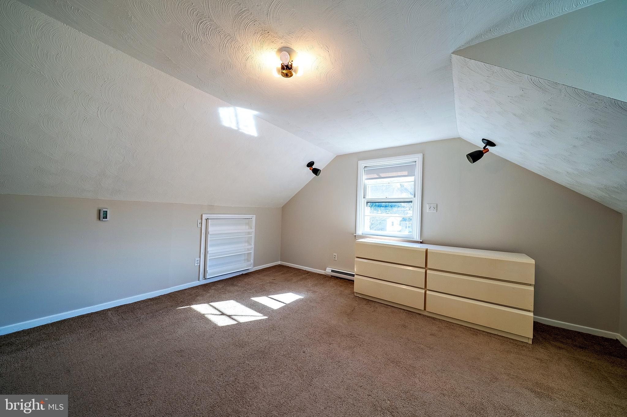 321 Wynnewood Road Ewing, NJ 08628 - Photo 28 of 31 an empty room with windows