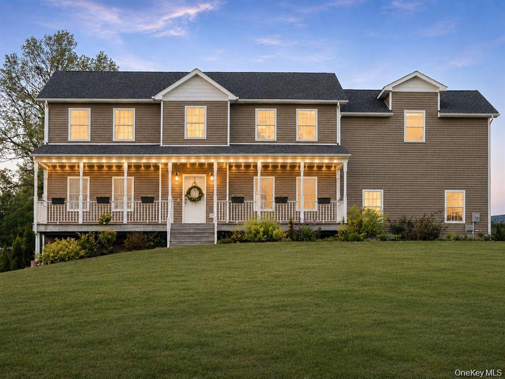 133 Old Chester Road Goshen, NY 10924 - Photo 2 of 33 a front view of a house with a garden