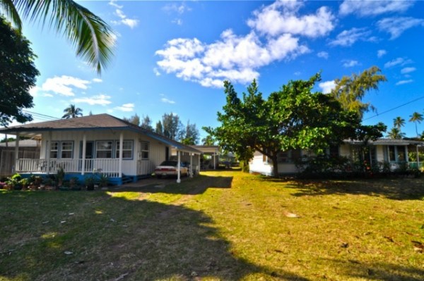 8630 Elepaio Road Kekaha, HI 96752 - Photo 1 of 20 a view of a house with swimming pool and sitting area