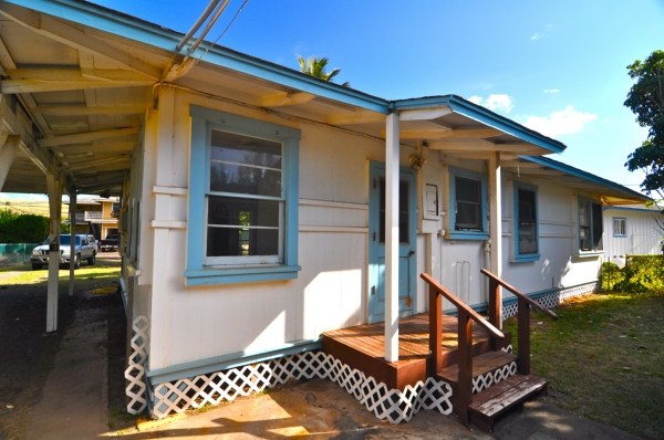 8630 Elepaio Road Kekaha, HI 96752 - Photo 3 of 20 a front view of a house with patio