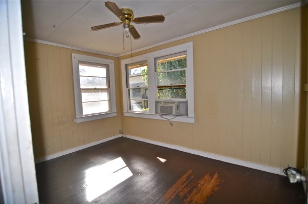 8630 Elepaio Road Kekaha, HI 96752 - Photo 6 of 20 a view of empty room with wooden floor and fan