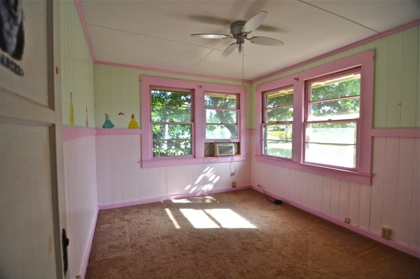 8630 Elepaio Road Kekaha, HI 96752 - Photo 8 of 20 a view of an empty room with a window